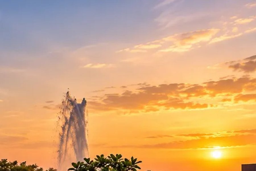 Fountains and sunset sky over the garden lawn – L&T Realty Sector 86 Gurgaon